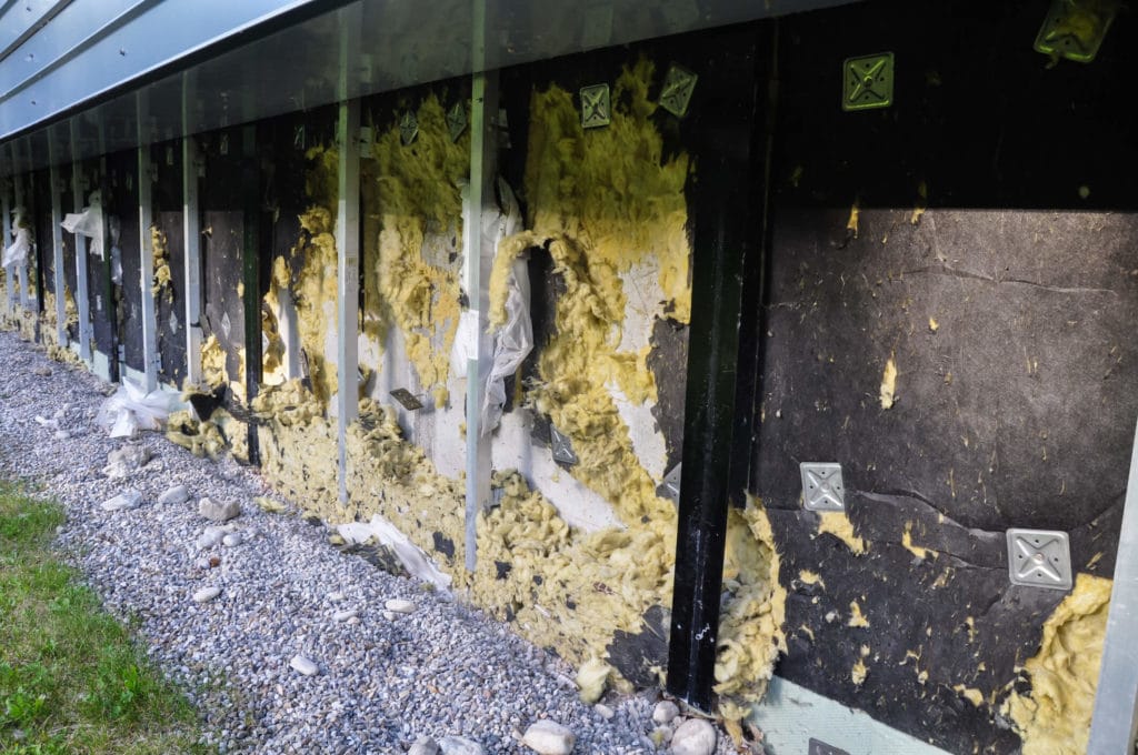 Learn the ways that mice can damage your house without a pest control company Damaged house insulation from mice