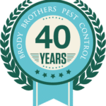 badge icon celebrating 40 years of pest control in Maryland